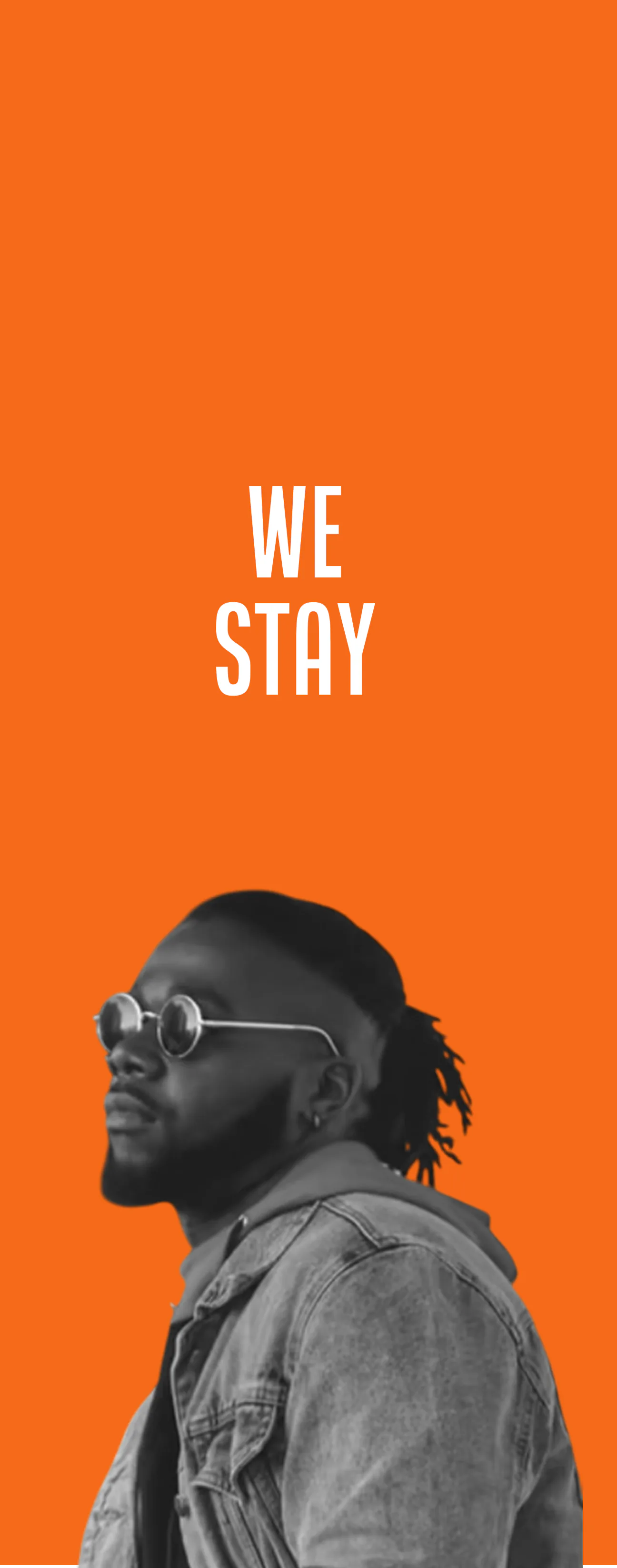 Black and white side profile of a man with sunglasses, beard, and dreadlocks tied back, wearing a denim jacket over a hoodie, set against a solid orange background with the words 'WE STAY' above him in white capital letters.
